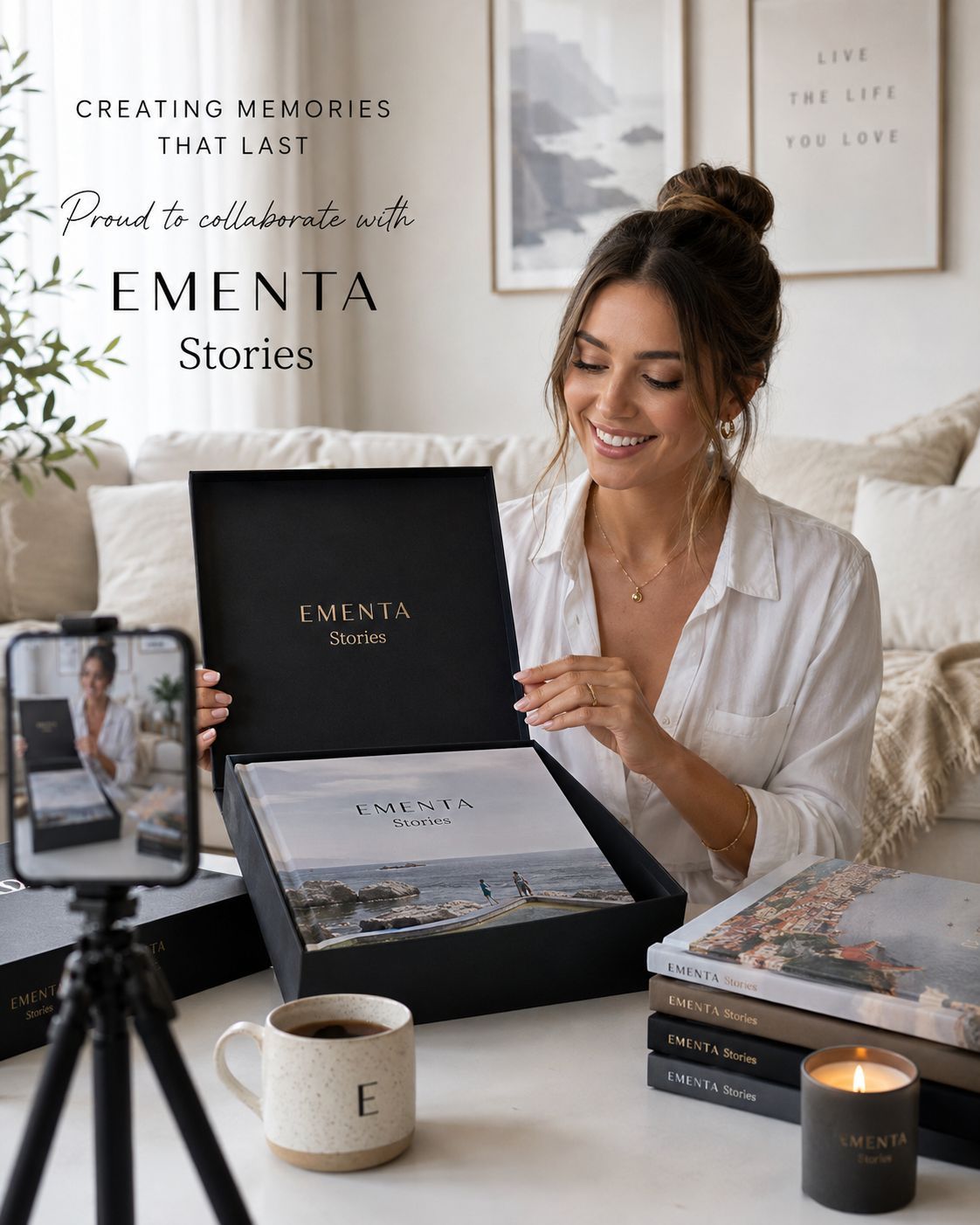 A premium EMENTA Stories photo book being unboxed from its gift box at home